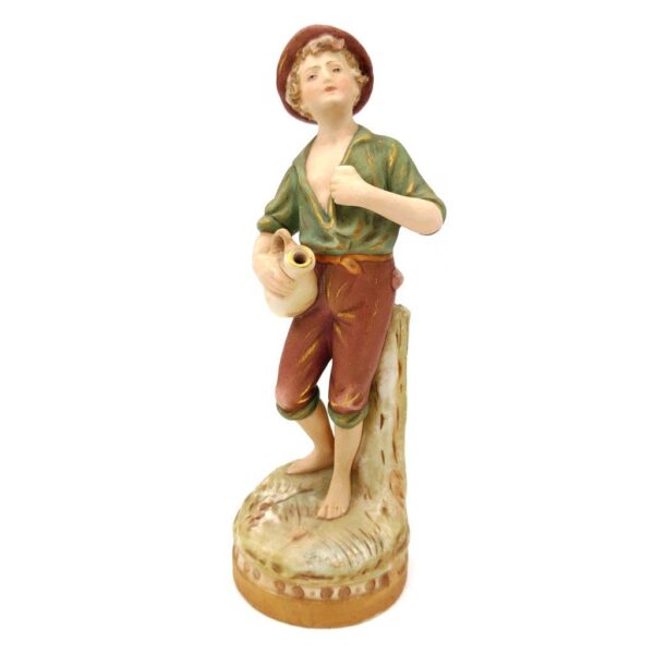 porcelánová soška značky Royal Dux, model: chlapec s džbánem, bronz dekor se zlacením