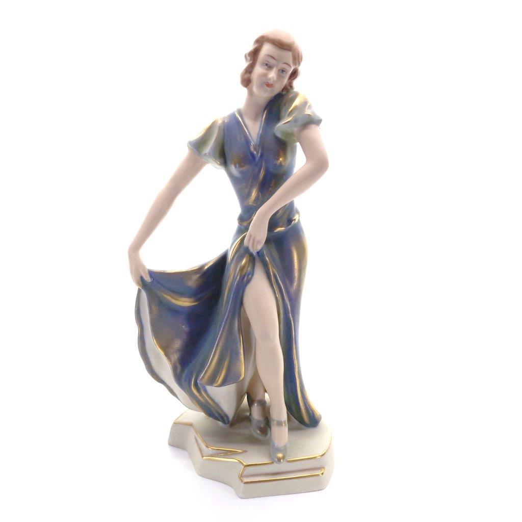 porcelánová soška značky Royal Dux, model: Art deco dívka v modrých šatech, modro-zlatý dekor