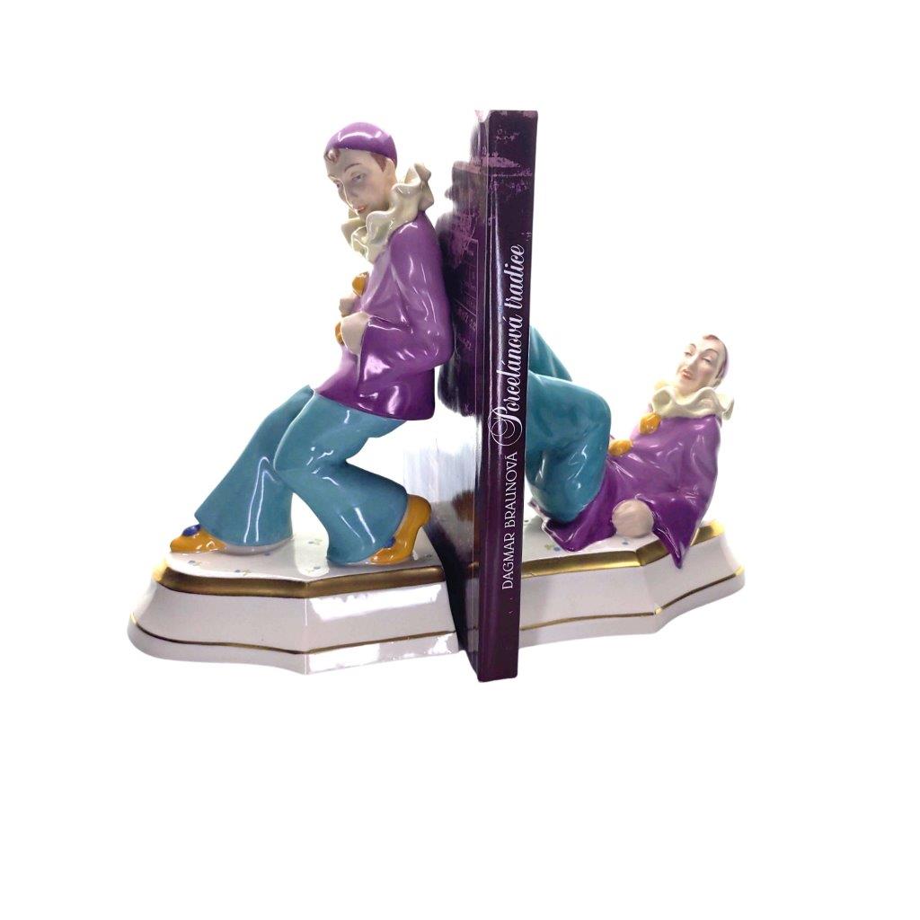 porcelánové figury značky Royal Dux, model: Pieroti - zarážky na knihy, saxe dekor