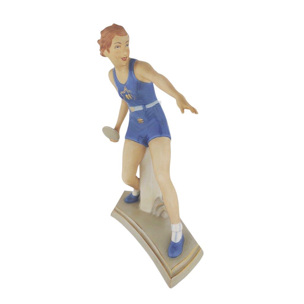 porcelánová socha duchcovské porcelánky, značka Royal Dux, model: Žena s diskem, modrý dekor se zlacením