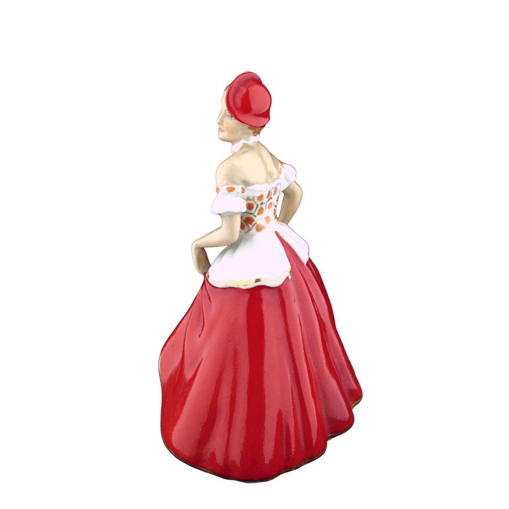 porcelánová figura značky Royal Dux, model: dívka v kloboučku, červený dekor se zlacením