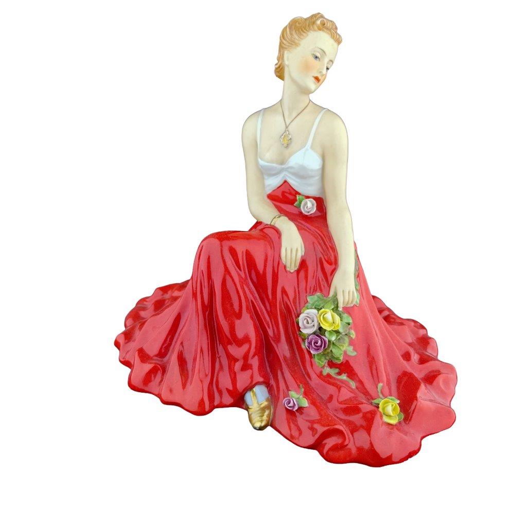 porcelánová figura značky Royal Dux, model: dáma s růžemi, červený dekor se zlacením