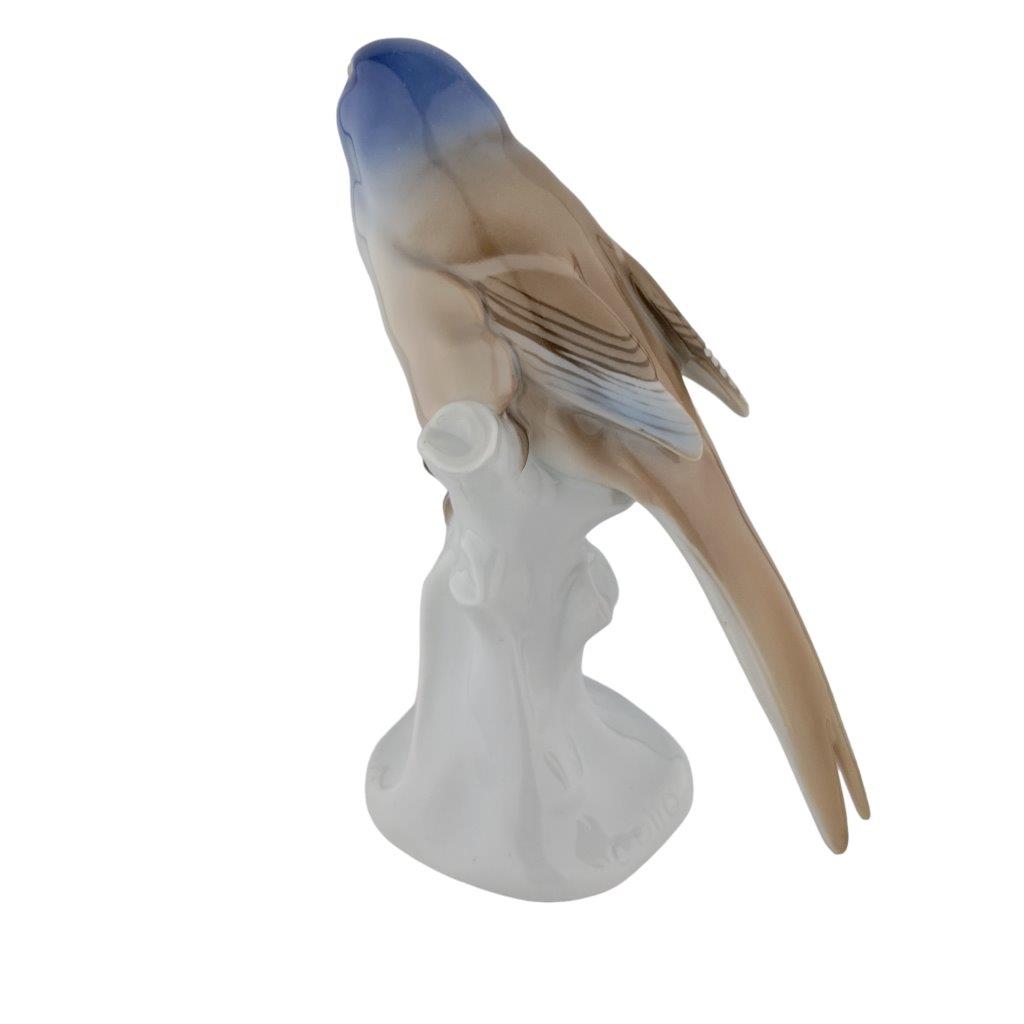 porcelánová figurka ptáčka značky Rosenthal, model: Pěvuška modrá, glazovaný porcelán